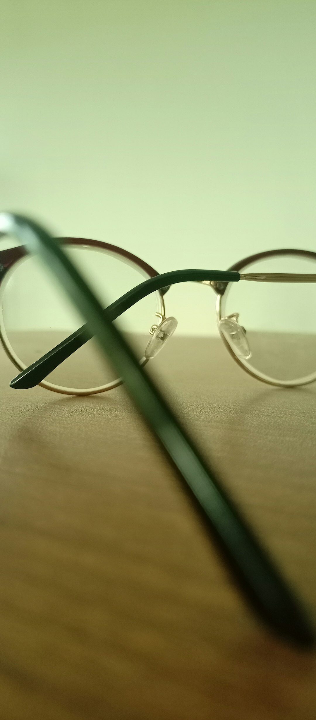 Elegant luxury prescription eyeglasses on a wooden table